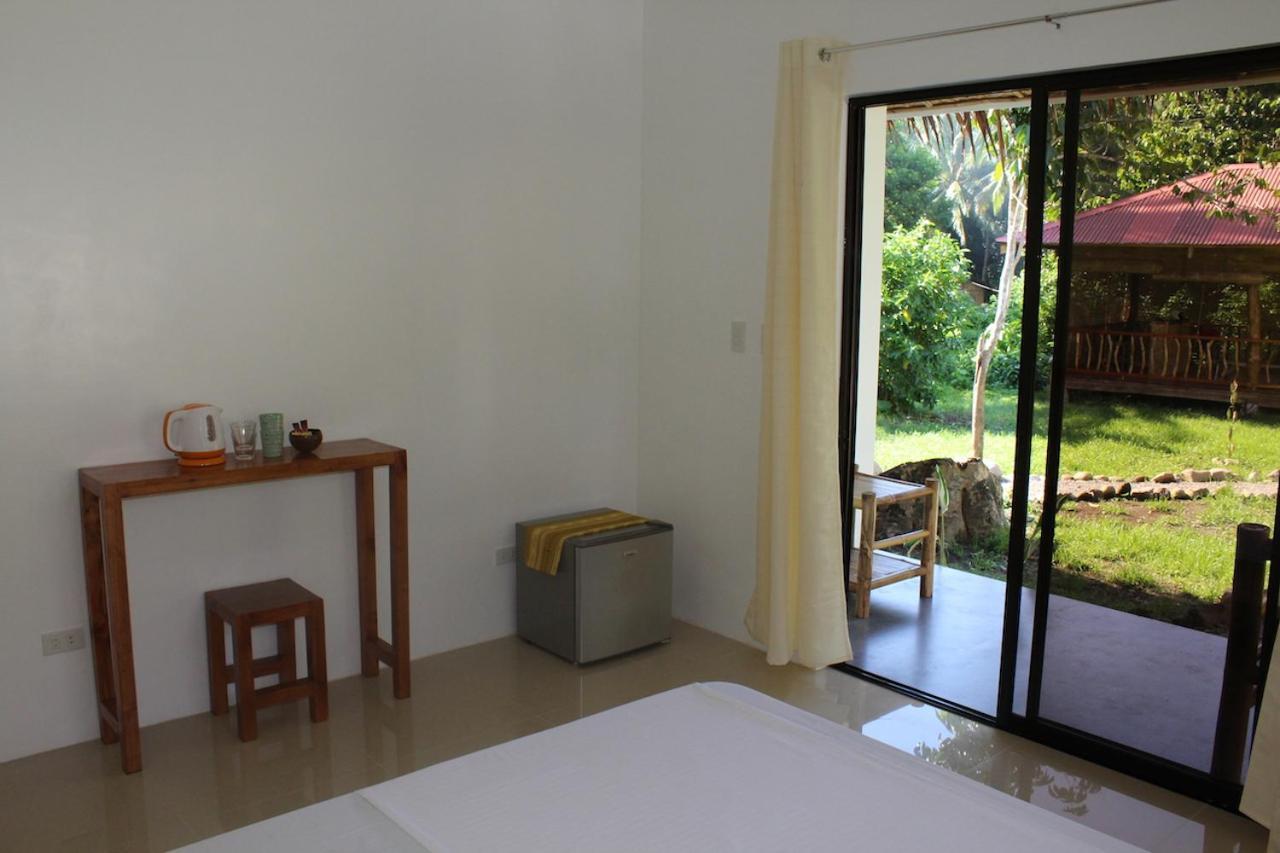 Happy Coconut Camiguin Hotel Mambajao Exterior photo